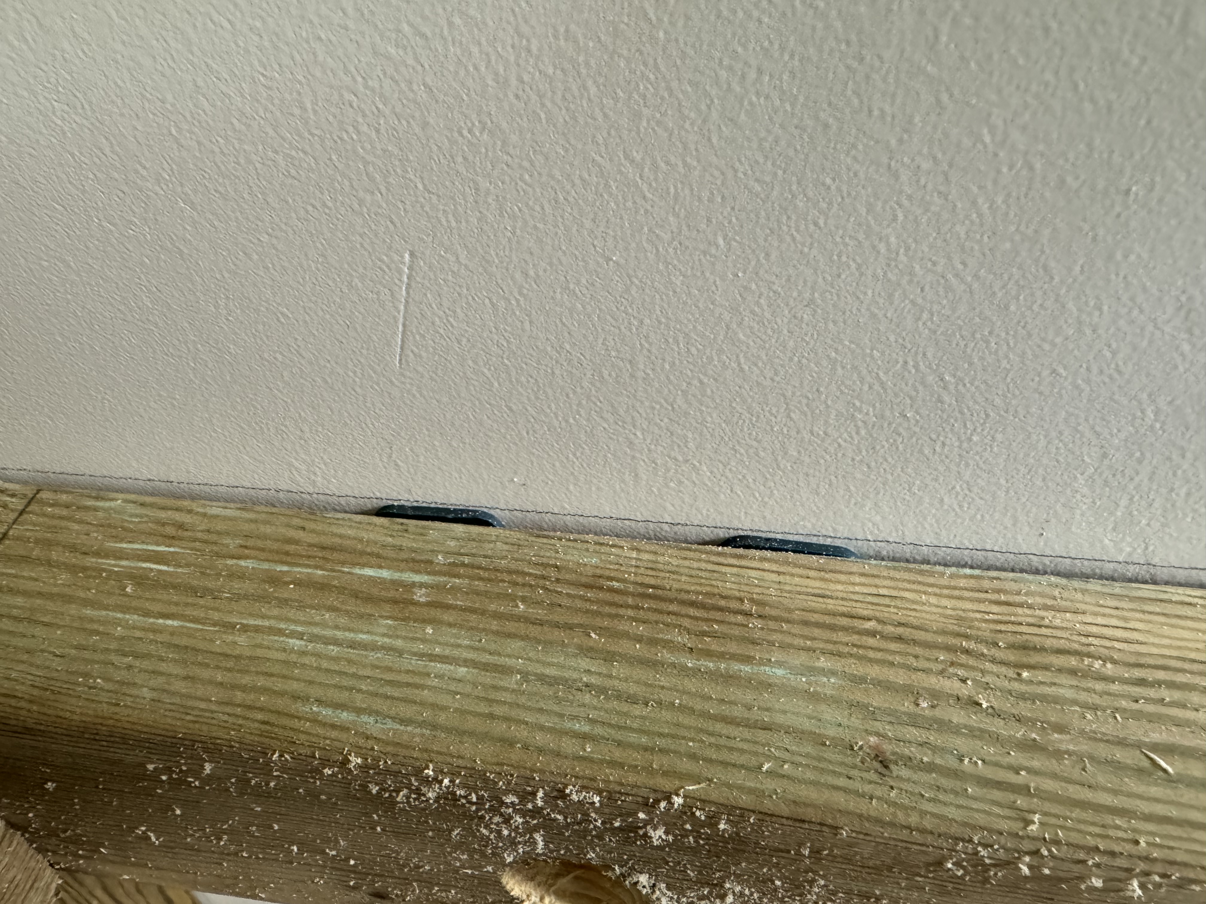 Fixation de la structure au mur