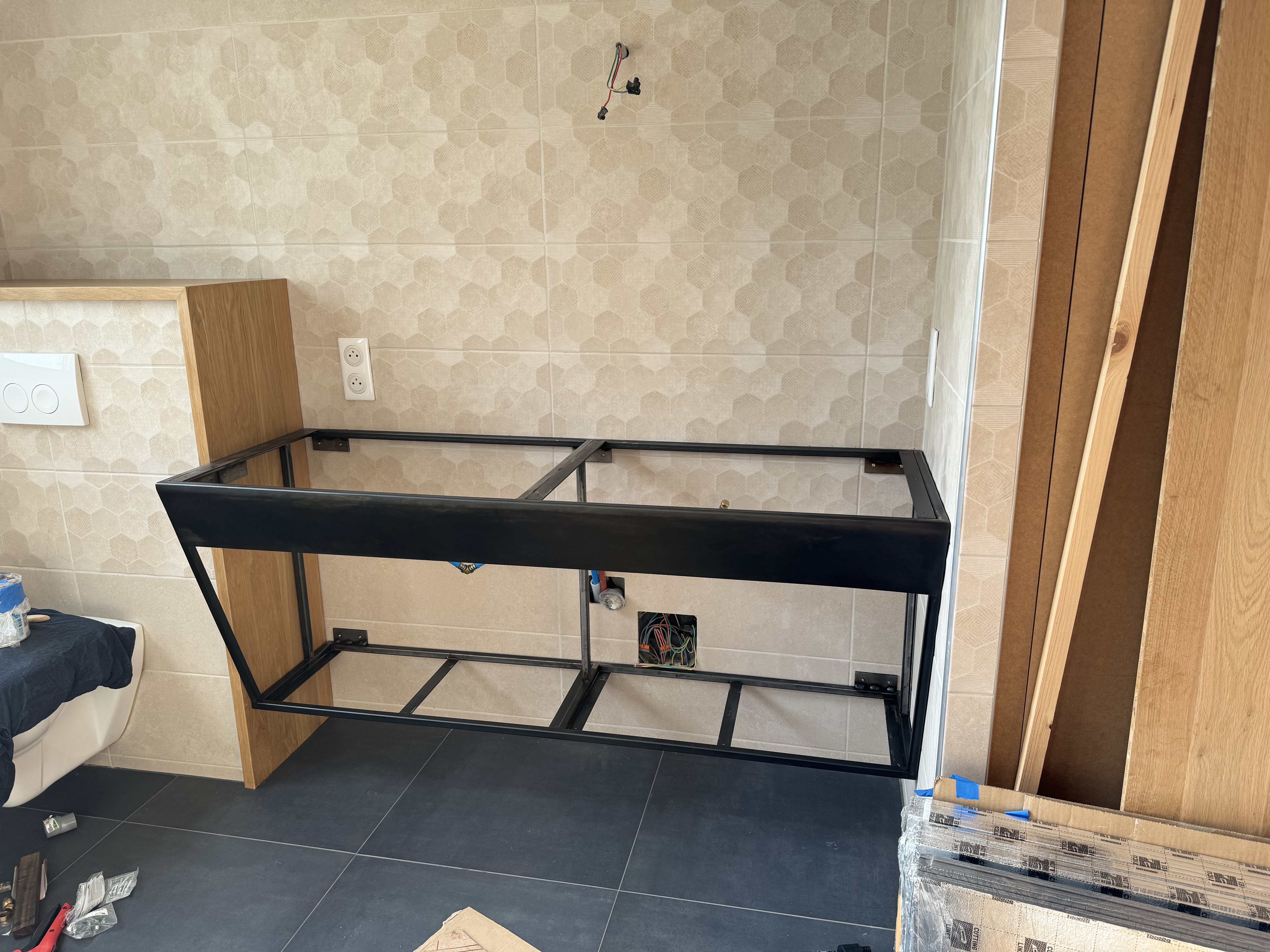 Fixation de l’ossature au mur